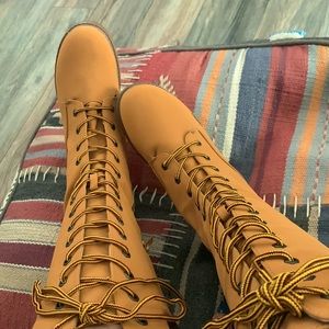 Tall lace-up boots
